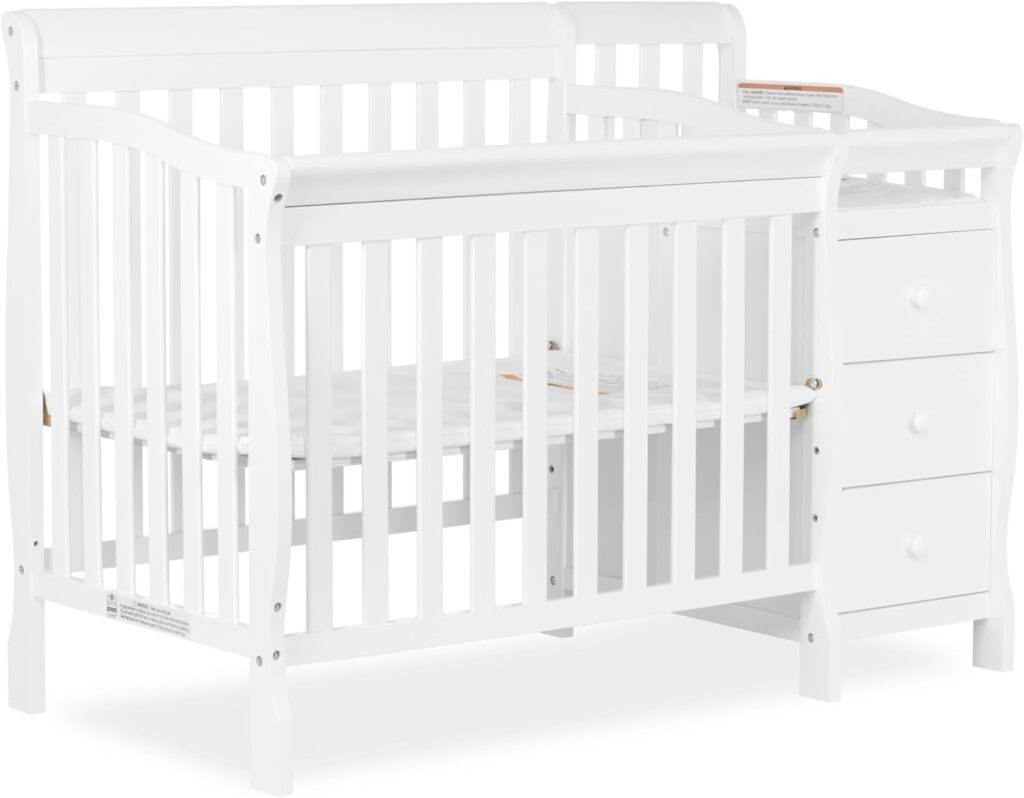 White cribs with changing table