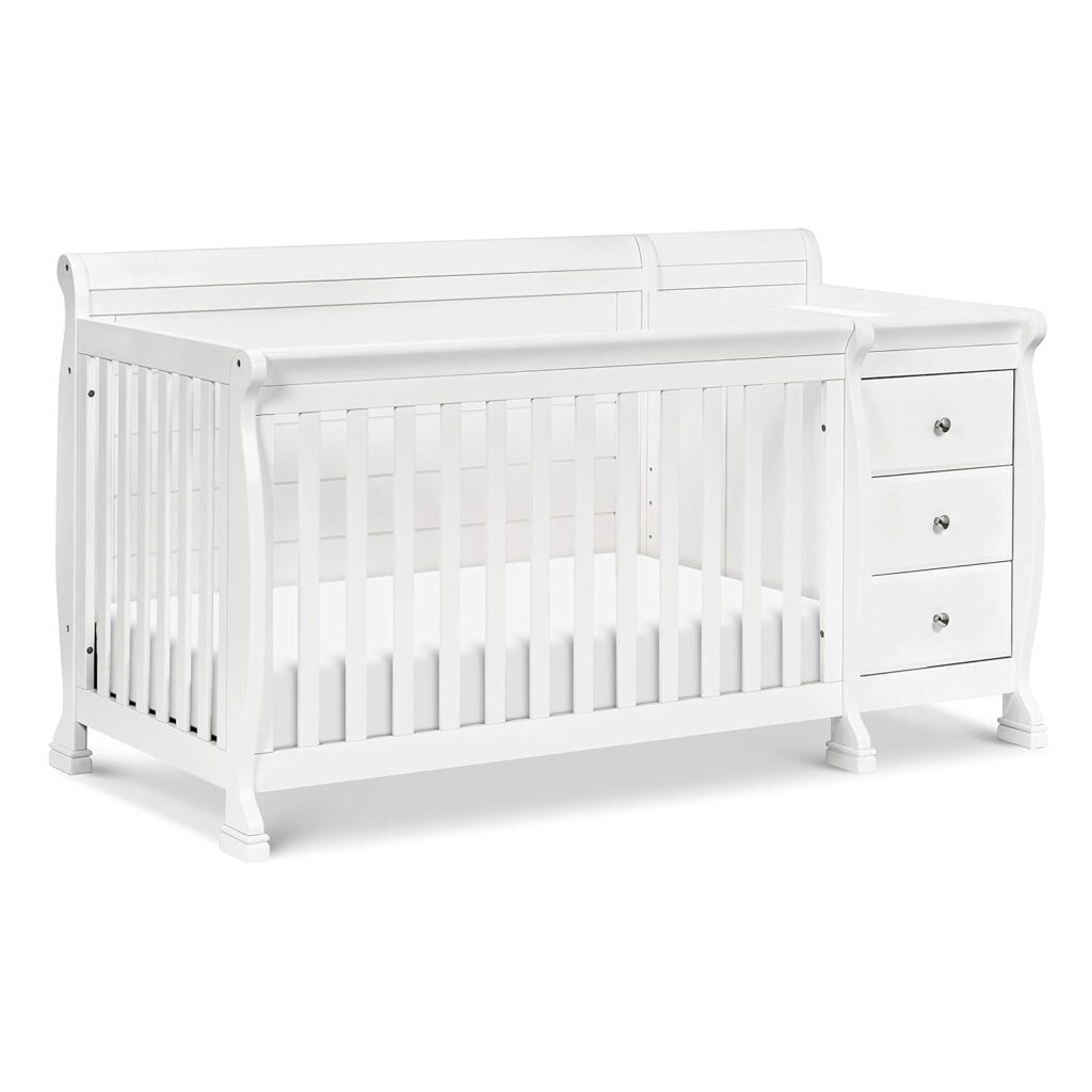 White cribs with changing tables
